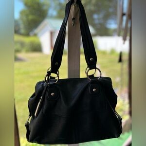 Antonio Melani purse has been used and loved. See pics for proof of condition.